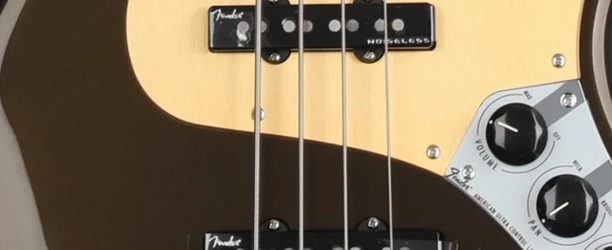 Up-close look at a Fender bass with Fender brand Noiseless pickups. Up-close look at a Fender bass with Fender brand Noiseless pickups.